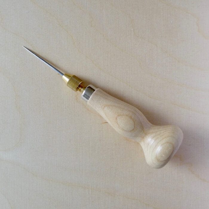 Poinçon de reliure