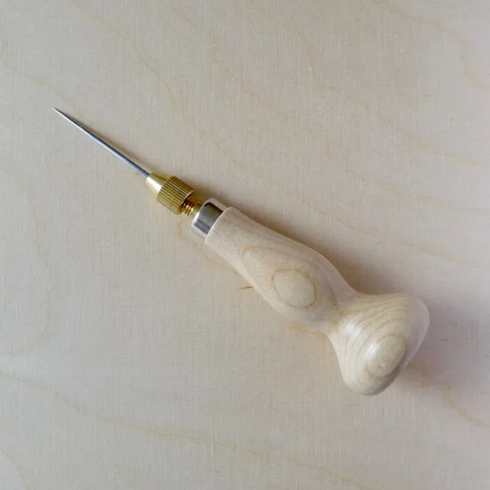 Poinçon de reliure